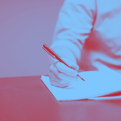 Storytelling starts on paper, like the man writing in the picture above, but ends in the mind of your audience.